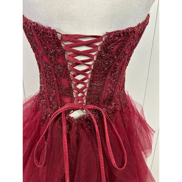 Prom Bay size 6 prom dress in the color wine. Corset with Lace up back & Ruffles - Picture 3 of 9